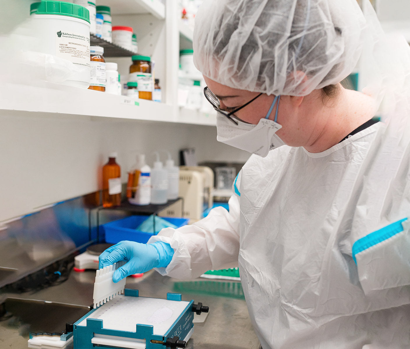 Licensed pharmacist compounding a bioidentical hormone formula at Thornhill's Pharmacy